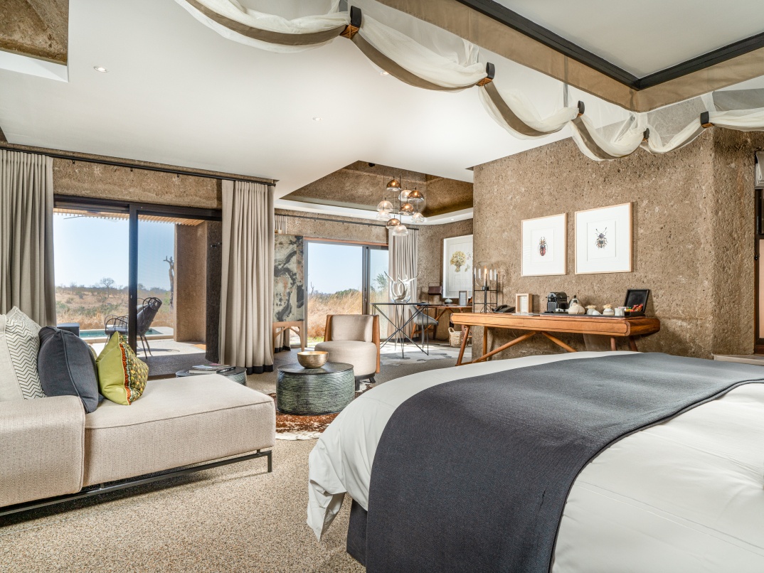 Spacious bedroom earth lodge luxury suite