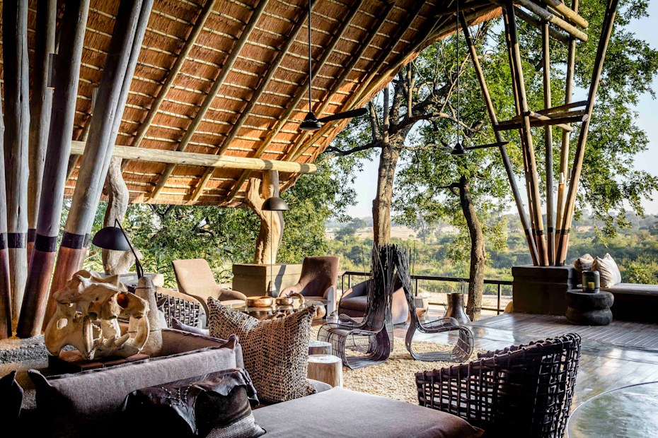 Sss boulders lodge main lounge overlooking bush adriaan louw