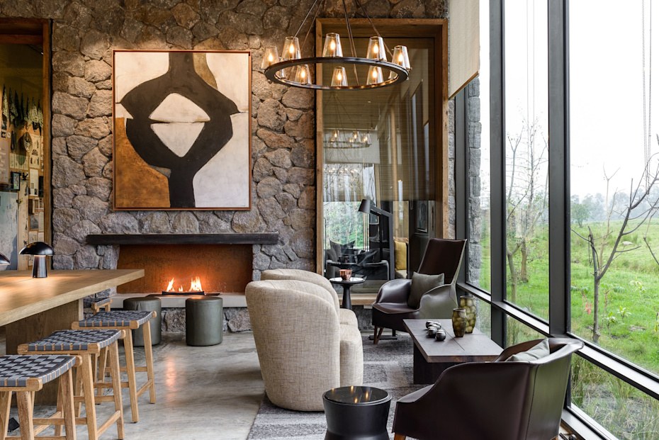 Kwitonda main lounge area with bar deli white sofa and large windows adriaan louw