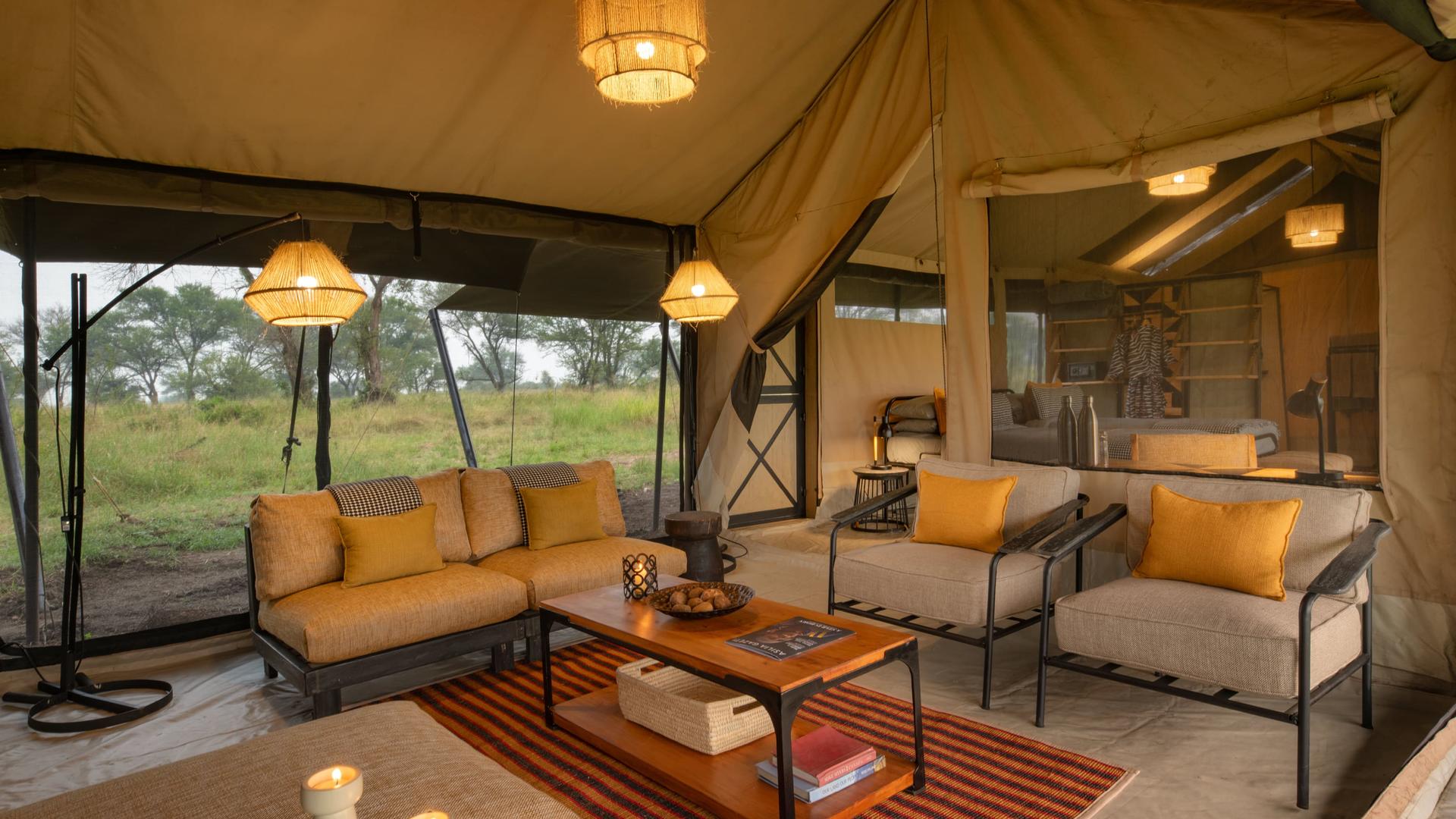 Asilia africa ubuntu migration camp family tent lounge area