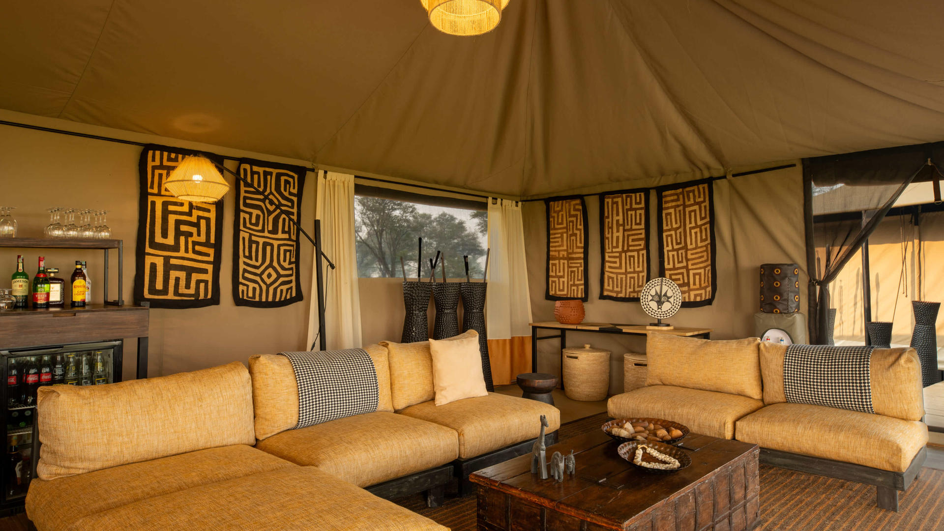 Asilia africa ubuntu migration camp lounge in main area