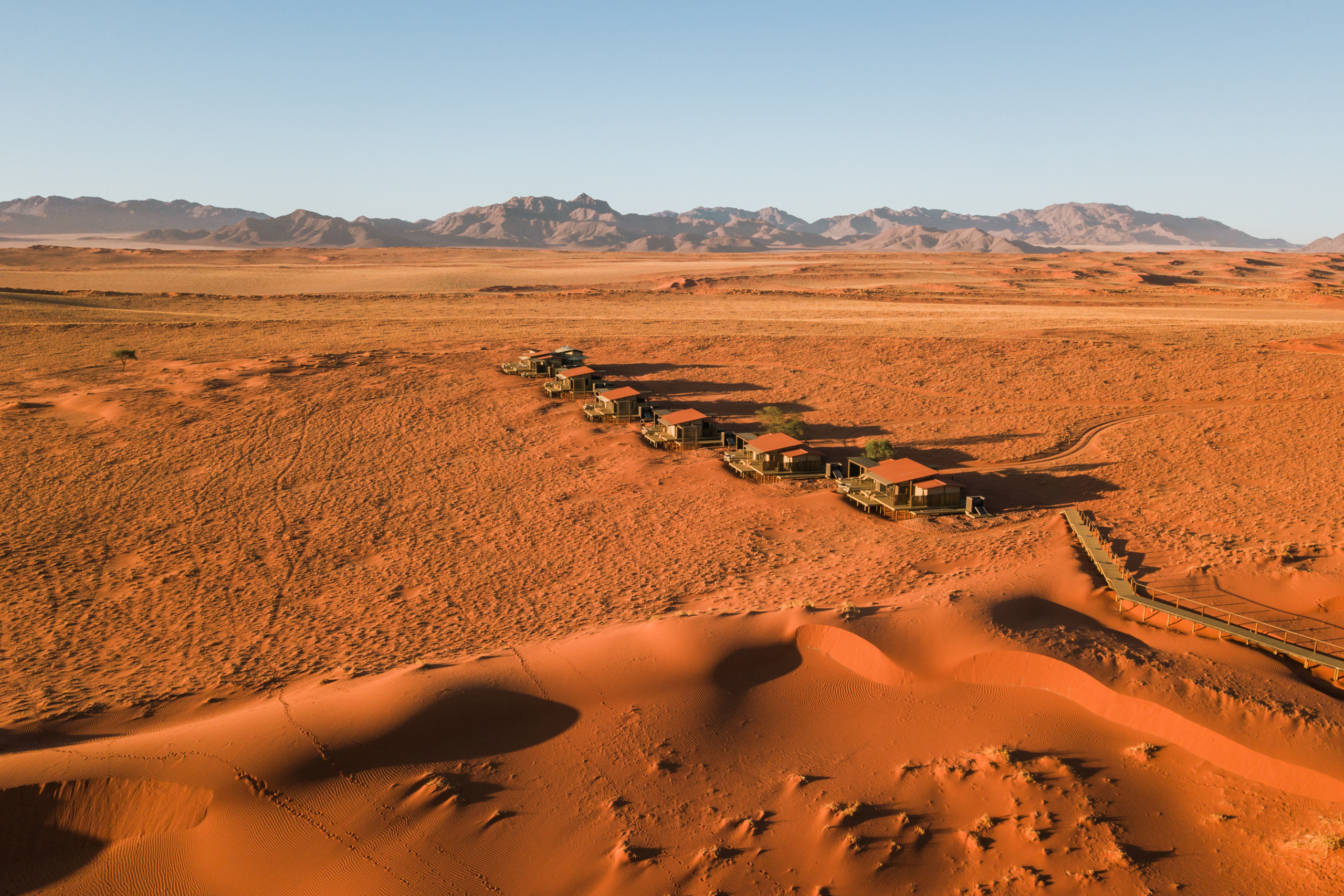 Wolwedans collection desert lodge aerials blending into orange sands 2